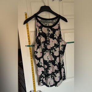 Torrid lovesick tank top with grommets. Black with pink green flowers. Size 2.